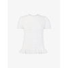 Smocked-panel ruffle-hem cotton top