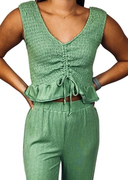 flounce around town top in sage green