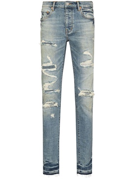 P001 Vintage distressed-finish skinny jeans