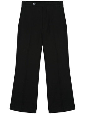 high-waisted flared trousers