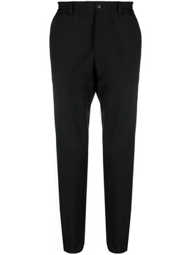 Chase logo-patch tapered trousers 