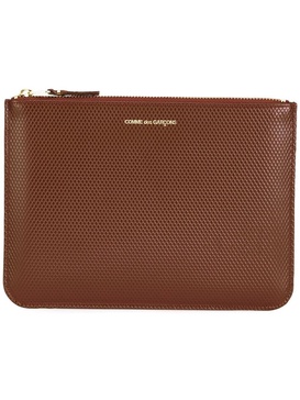 textured leather clutch