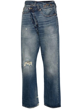 Crossover distressed skinny jeans