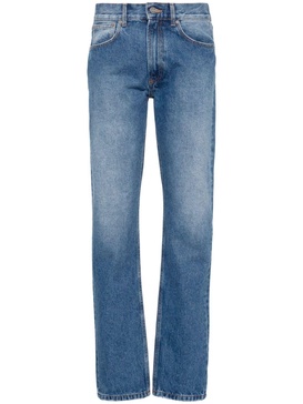 washed tapered jeans