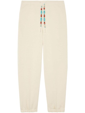 bead-embellished tapered trousers