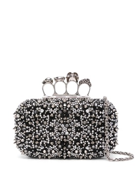 Knuckle embellished leather clutch