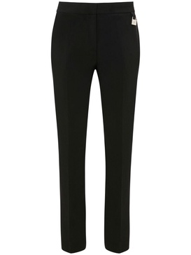 padlock-embellished slim-leg trousers