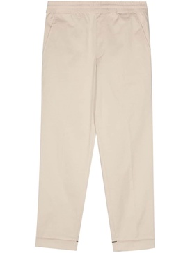 low-waist slim-fit trousers