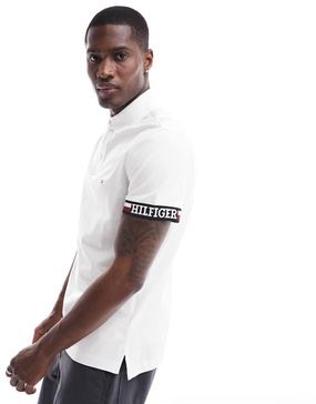 Tommy Hilfiger flag logo cuff slim polo shirt in white