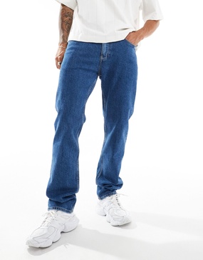 Tommy Jeans Ryan regular straight jeans in mid wash with flag detail