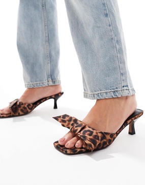 ASOS DESIGN Wide Fit Hyphen bow detail mid heeled mules in leopard