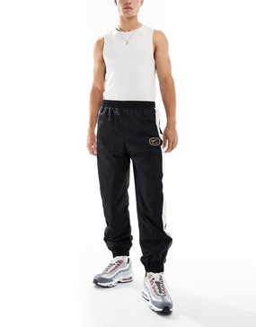 Nike Swoosh Air woven sweatpants in black and white