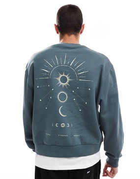 ASOS DESIGN boxy oversized sweatshirt with back celestial print in washed navy