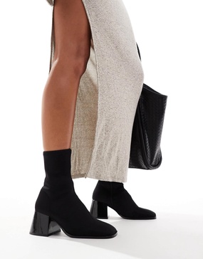 ASOS DESIGN Radiant flared block heel boots in black neoprene