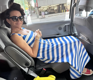 yellow handbag, red slide sandals, blue striped dress, and high heels?