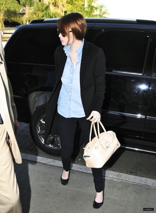 Emma Stone Arriving at LAX Airport February 3, 2011