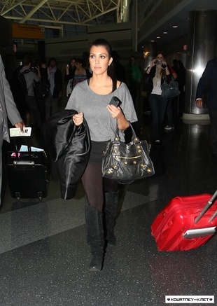 Kourtney Kardashian Inside JFK Airport June 10, 2010