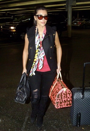 Kim Kardashian Arriving in Miami May 16, 2009