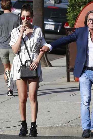 Bella Hadid with Her Dad Mohamed Hadid August 20, 2015