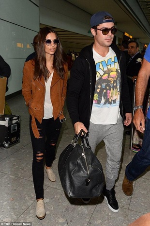 Emily Ratajkowski with Zac Efron at Heathrow Airport August 10, 2015