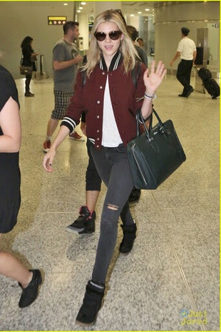 Nicola Peltz Toronto Airport September 5, 2014