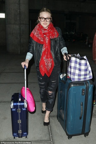 Dakota Fanning at JFK Airport March 22, 2015