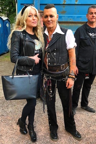 Johnny Depp With Fan in Helsinki June 10, 2018