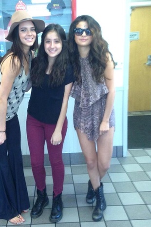 Selena Gomez with a Fan April 11, 2014