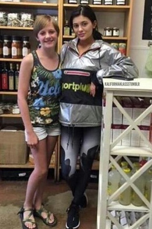 Kylie Jenner with a Fan July 25, 2015