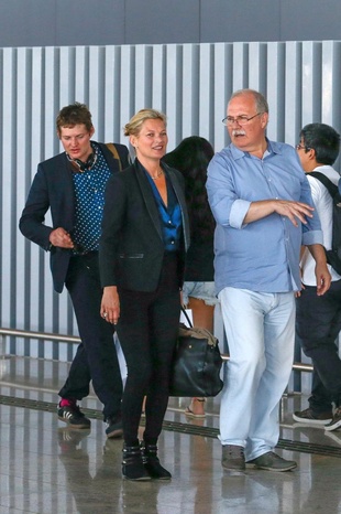 Kate Moss and Her Entourage Arrive at Guarulhos Airport Prior to Their Departing Flight to London. April 20, 2016