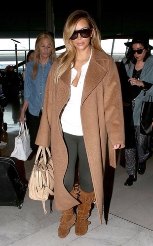 Kim Kardashian Roissy Airport in Paris October 1, 2013