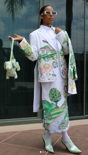 green ankle boots, white skirt, jacket, and handbag?