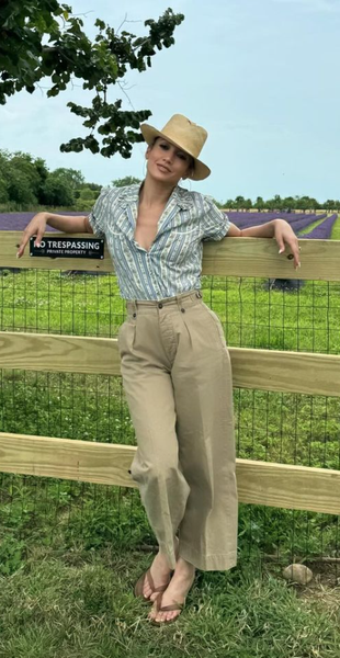 brown flip flops, beige pants, and floral shirt?