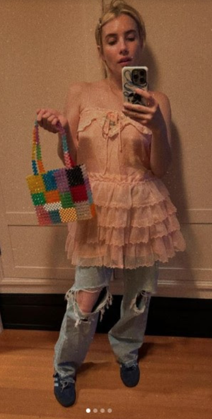 pink ruffle top, beaded bag, ripped jeans, and sneakers?