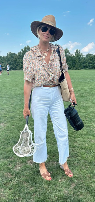 floral ruffle shirt, belt, jeans, and sanadls?