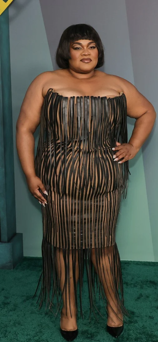 Vine Joy Randolph’s black strapless fringe dress?