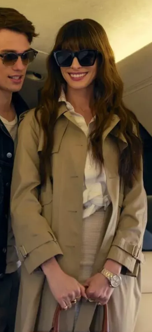 black sunglasses and beige trench coat?