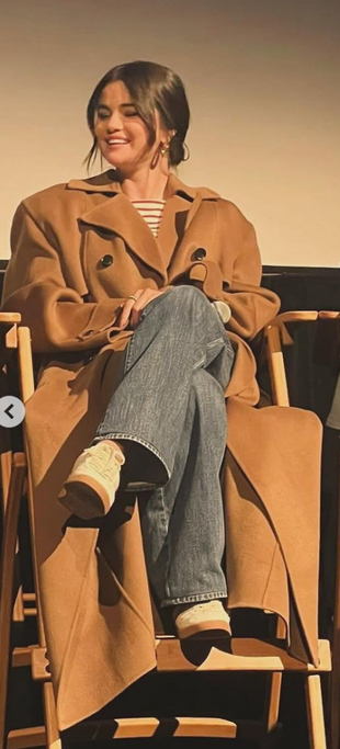 gold jewelry, beige coat, and tan sneakers?