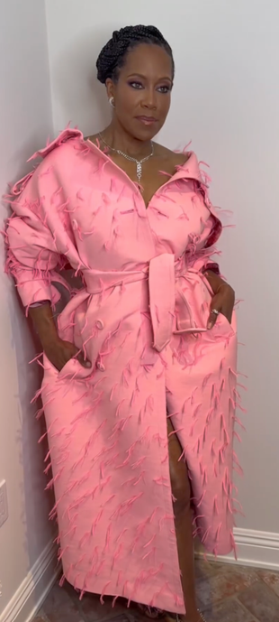 pink belted feather coat?