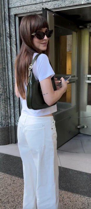 white jeans, black sunglasses, shirt, and handbag?