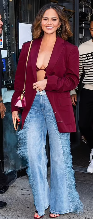 blue feather jeans, red sandals, top and handbag?