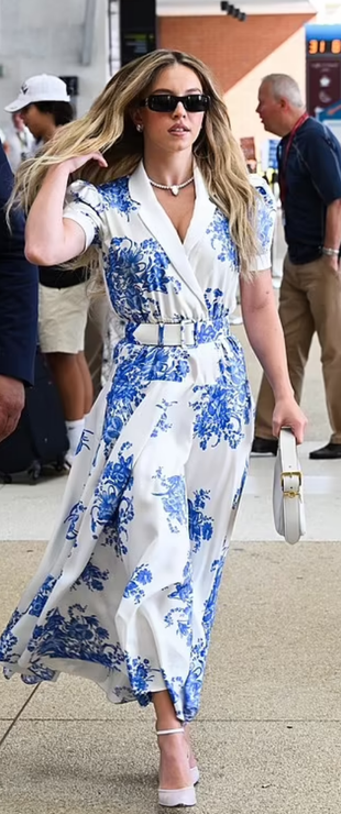 black sunglasses and blue floral belted dress?