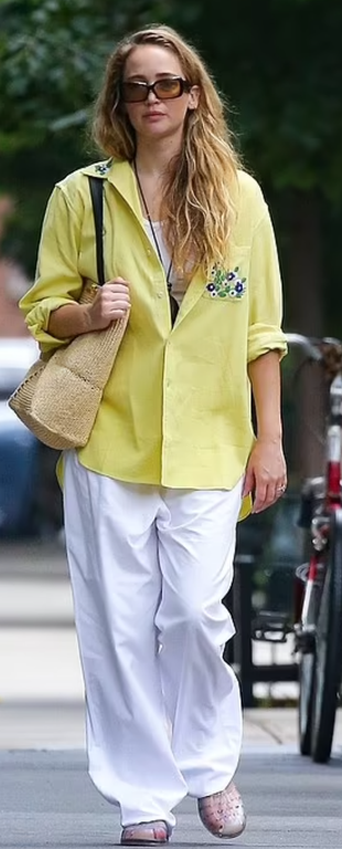 white pants, jelly sandals, beige handbag, and yellow floral dress?