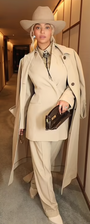 beige coat, jacket, pants, and brown handbag?