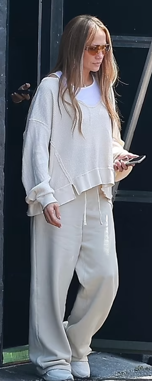 white pants, sweatshirt, sneakers, and handbag?