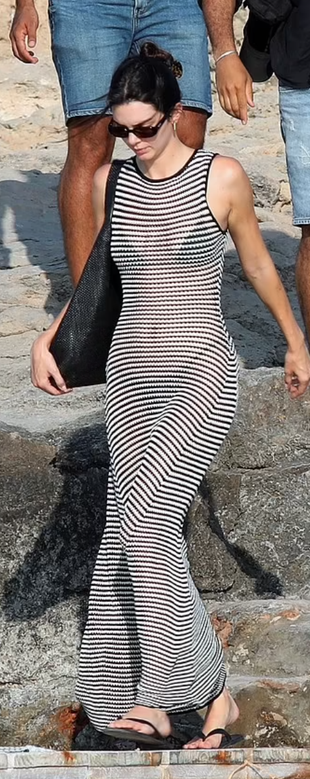 black woven handbag, flip flops, and striped dress?