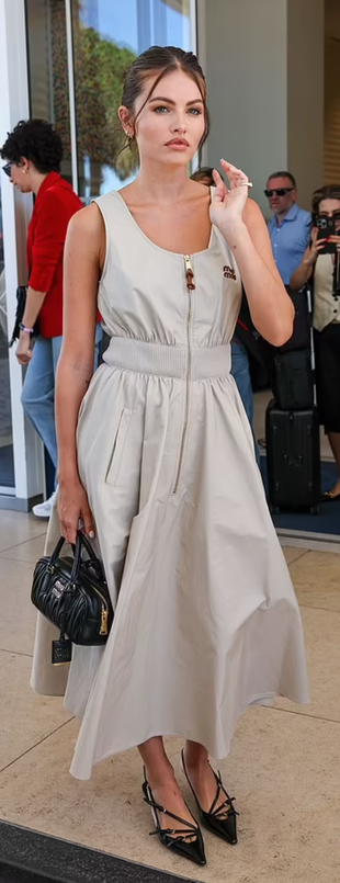 beige dress and black quilted handbag?