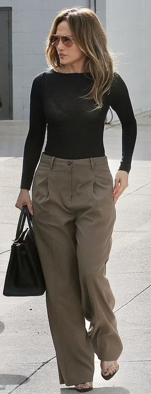 beige pants, mule sandals, black handbag, and aviator sunglasses?