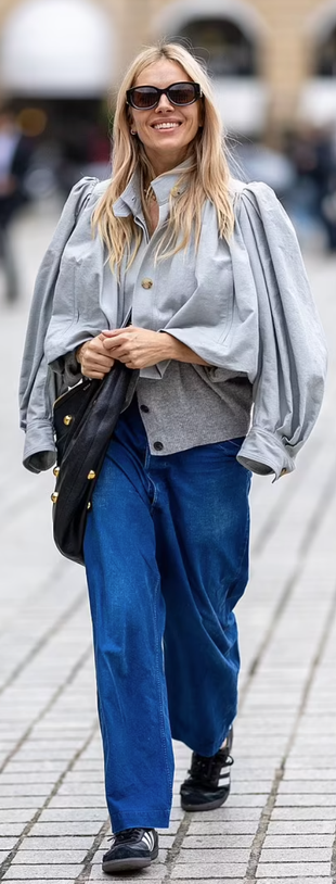 gray jacket, black studded handbag, and sneakers?