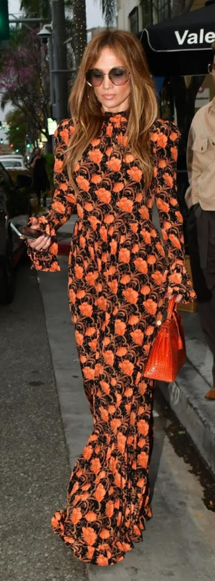 floral black print maxi dress and red handbag?